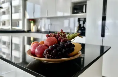 a bowl of fruit on a counter in a kitchen at Sawansa 33A 400m2 Luxury Seaview Pool near Beach in Patong Beach
