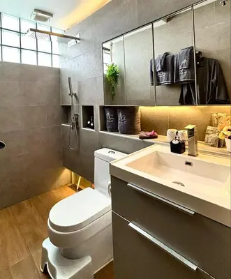 a bathroom with a white toilet and a sink at Sawansa 33B 425m2 Luxury Seaview Pool near Beach in Patong Beach