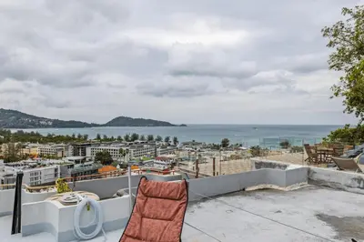 a balcony with a view of the ocean at Sawansa 20 3BR 300m2 Modern Seaview house near Beach in Patong Beach