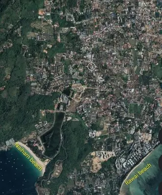 a satellite image of a city with a white circle at Sawadee622,Naiharn & Rawai beach Phuket in Rawai Beach