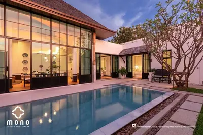 an image of a swimming pool in front of a house at Skyframe pool villa near Bangtao beach, Bluetree, Thalang in Ban Pak Lak