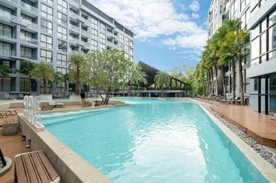 a swimming pool in the middle of a building at Apartment 1 - bedroom Kamala in Kamala Beach