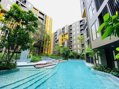 a swimming pool in a city with buildings at The Base Central Phuket-C54BS in Phuket Town