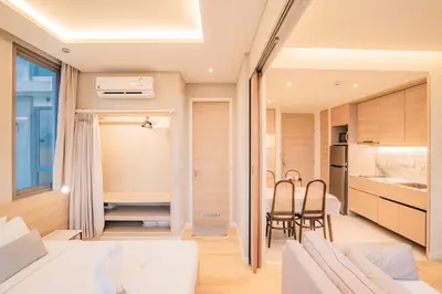 a room with a kitchen and a dining room at The Paradise sea view apartment in Krabi town
