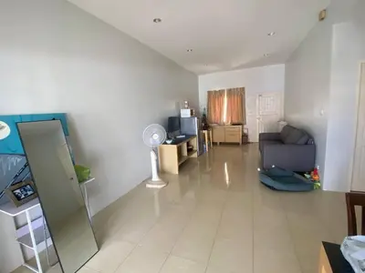 a large living room with a couch and a table at Home House in Ban Bang Chak