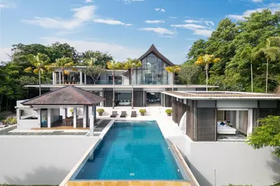 an aerial view of a house with a swimming pool at Exclusive Oceanfront Living, 5BR Pool Villa Elegance in Ko Lek