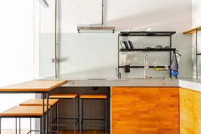 a kitchen with a sink and wooden counter top at Cactus Villa 2024, Krabi in Klong Muang Beach