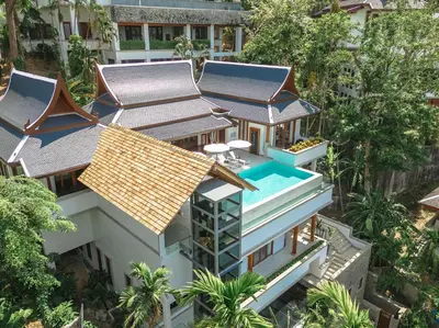 an aerial view of a building with a swimming pool at Baan View Talay - Sea View Zenith Villa By Elite Havens in Surin Beach