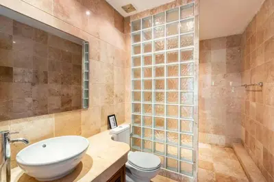 a bathroom with a sink and a toilet and a shower at Surin villa by Pattara in Surin Beach