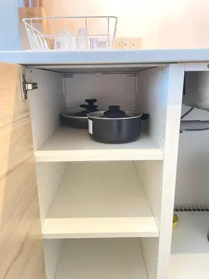 a shelf with a frying pan on top of it at Studio surin-bangtao beach in Surin Beach