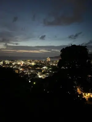a view of a city at night at Thebirdhouse Patong Phuket203 in Patong Beach