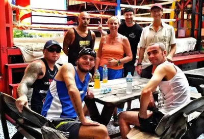 a group of people posing for a picture at a table at Reggaein in Phi Phi Don
