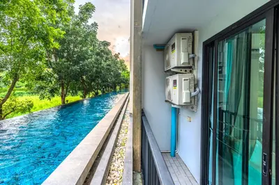 a view of a river from a window at ZcapeX2 94-18 by Silqstay in Thalang