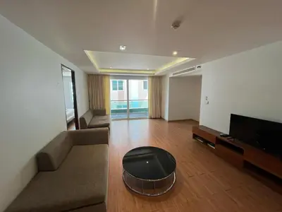 a living room with a couch and a tv at Luxurious 5 Bedroom Condo, private pool, in Patong with Seaview in Patong Beach