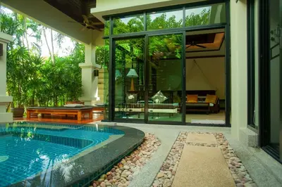 a house with a swimming pool in a yard at Rose Pool Villa The perfect private oasis in Rawai Beach