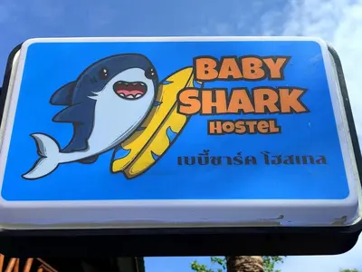 a sign for a baby shark hospital at Babyshark Hostel - Loh Dalum Bay in Phi Phi Don