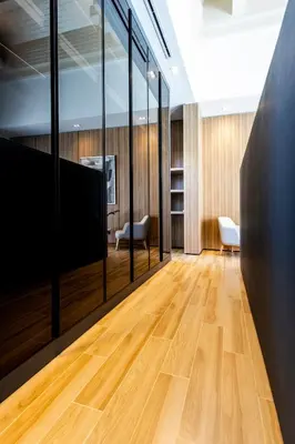 an office with a wooden floor and glass walls at Luxury 4 Bedroom Villa 1 Minute from Laguna Phuket in Bang Tao Beach