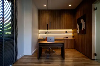 a room with a table with a laptop on it at Luxury 4 Bedroom Villa 1 Minute from Laguna Phuket in Bang Tao Beach