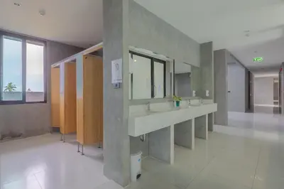 a bathroom with a sink and a mirror at ReLife The Windy Condo B218 Naiharn in Rawai Beach