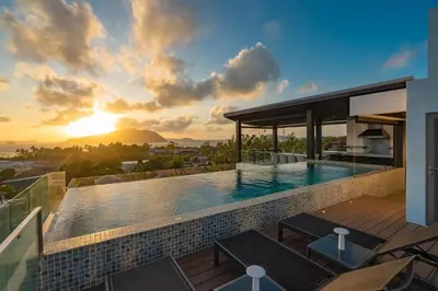a villa with a swimming pool and the sunset at Luxury Seaview Villa 6BR - Villa Shine in Ban Saiyuan (1)