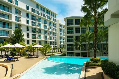 an image of a swimming pool in front of a building at 1Bd Сomfortable Apartment LaVita in Phuket Town