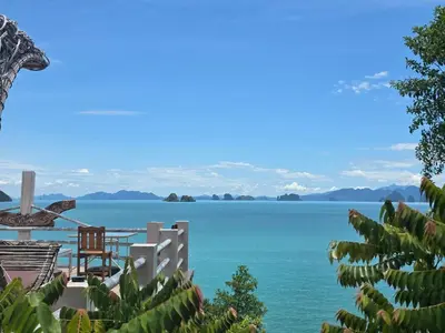 a view of the water from a house at Esmeralda View Resort - SHA Extra Plus in Ko Yao Yai