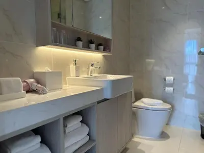 a bathroom with a sink and a toilet at Lake view apartment in Laguna in Bang Tao Beach