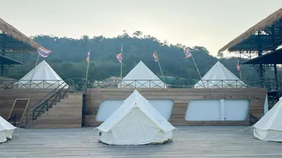 a group of tents in front of a building at Thailand Mountain Phuket in Patong Beach
