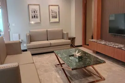 a living room with a couch and a coffee table at villa kamala regent 2 bedrooms in Kamala Beach