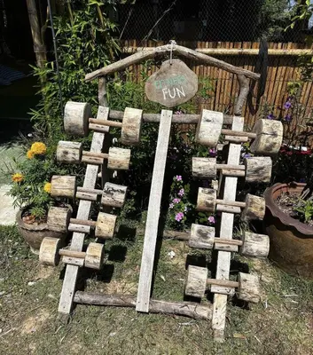 a garden made out of wooden logs at Sea True Valley Phuket ซี ทรู วัลเลย์ ภูเก็ต in Ban Ao Makham