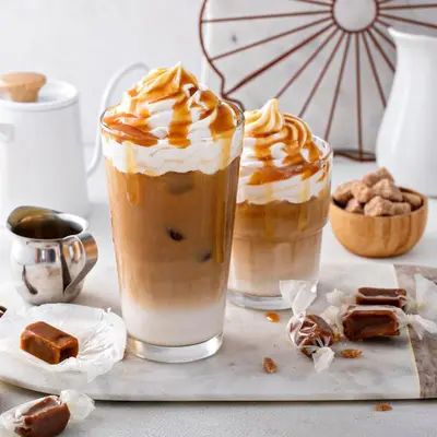 two cups of iced coffee sitting on a table at I Talay phuket in Karon Beach