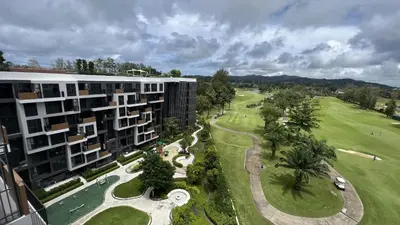 an overhead view of a building and a golf course at Sky Park Laguna Phuket in Laguna Phuket
