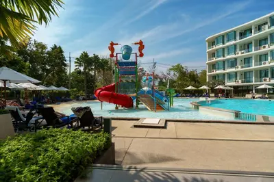 a pool with a water slide in a resort at Amazing View Duplex La Vita in Phuket Town