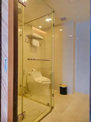 a glass shower in a bathroom with a toilet at Super Studio La Vita 2 pool in Rawai Beach