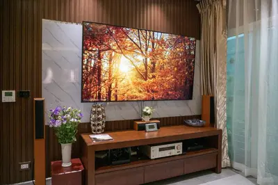 a flat screen tv hanging on a wall at 2 bedrooms Amani Pool Villa Phuket in Thalang