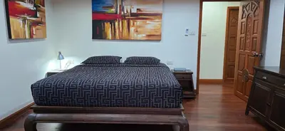 a bedroom with a bed in a room at PATONG TOWER Big Family APARTMENTs 2026 Pta in Patong Beach