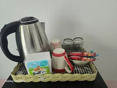 a counter with a blender and other kitchen utensils at NW House in Ao Nang Beach