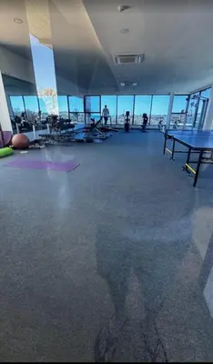 a room with a ping pong table in a gym at Condo with Roof top sea view in Rawai Beach