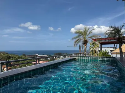 a swimming pool on top of a building at Luxury Seaview studio apartment at Karon beach in Karon Beach