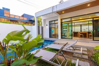 a villa with a swimming pool and a house at V172 Siena Villa Stunning 3-Bedroom & Private Pool in Kata Beach