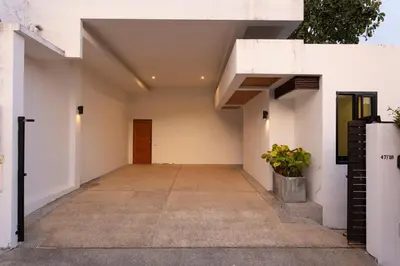 a hallway of a house with white walls at V172 Siena Villa Stunning 3-Bedroom & Private Pool in Kata Beach