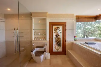 a bathroom with a tub and a toilet and a shower at Two bedrooms Penthouse Seaview Rawai Beach Phuket in Phuket Town