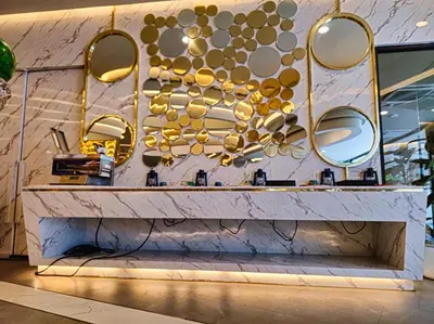 a counter with gold mirrors on a wall at Super 2Bdr Apartament La Vita Rawai Naiharn beach in Rawai Beach