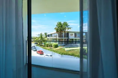 a view of a street from a window at Super 2Bdr Apartament La Vita Rawai Naiharn beach in Rawai Beach