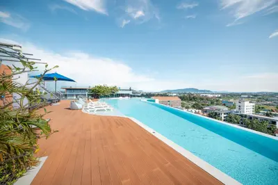 a swimming pool on the roof of a building at The Blue Hotel in Chalong