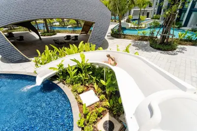 a water slide at a resort at Title Halo, 2 bedrooms apartment in Nai Yang Beach