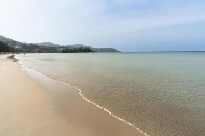 a view of a sandy beach with the ocean at Sunnyside Kata in Kata Beach