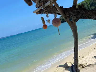 a view of the beach from a beach shack at Private Beach Camping on island at Koh Lon Island in Ko Lon
