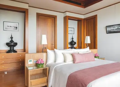 a bedroom with a large bed and two lamps at Villa 7 Miramare Andara Signature - The Most Exclusive Villa in Phuket in Amphoe Thalang