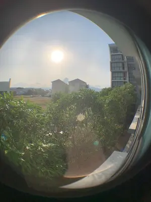 a view of a building from a window at Beautiful space in Ban Sam Kong